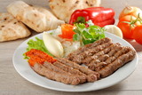 Cevapcici, a small skinless sausage cooked on the barbecue