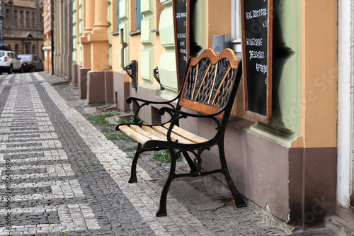 Bench near restaurant © Arkady Chubykin