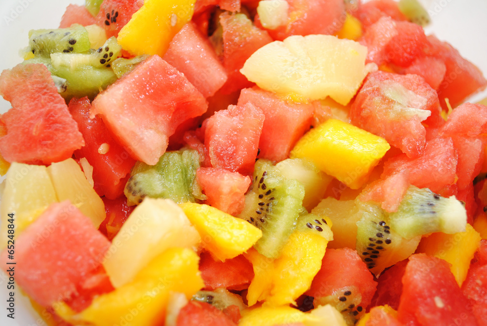 Tropical Fruit Salad with Melon, Mango, Kiwi and Pineapple Tropical Fruit Salad with Melon, Mango, Kiwi and Pineapple