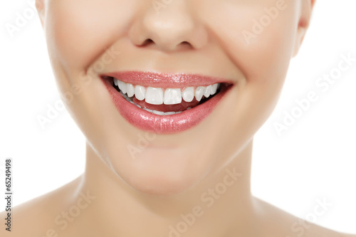 Young smiling woman, white background, copyspace