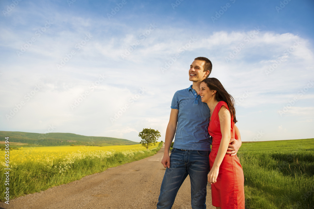 Couple in love on countryside road Couple in love on countryside road