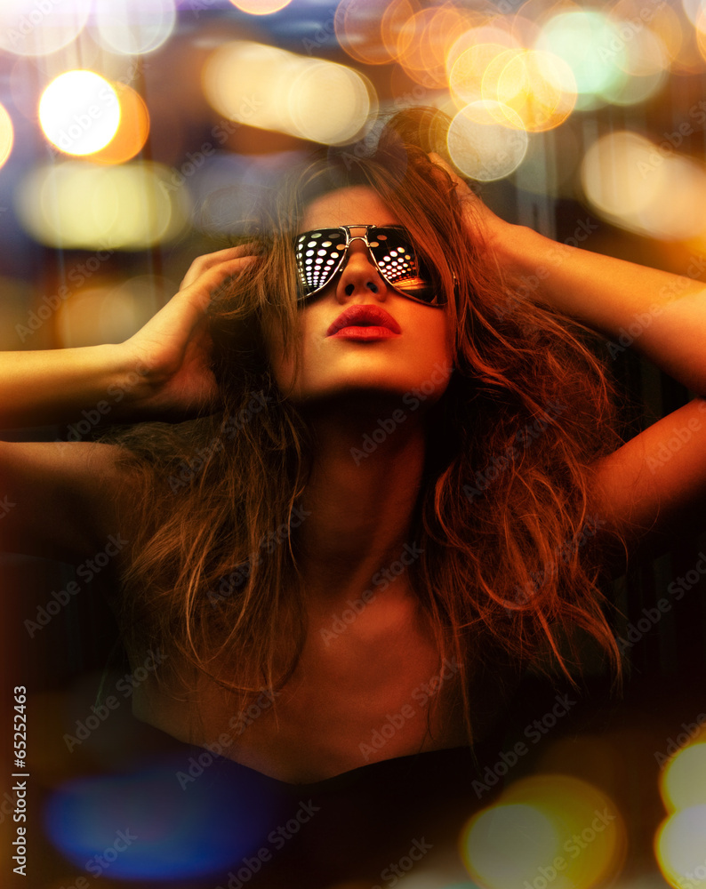 Fototapeta premium fashionable woman in nightclub