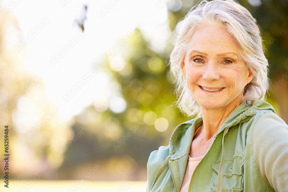 Fototapeta premium Outdoor Portrait Of Smiling Senior Woman