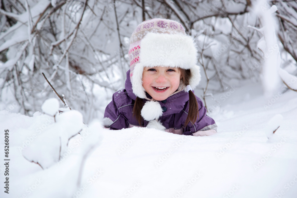 wonderful child in the snowy woods