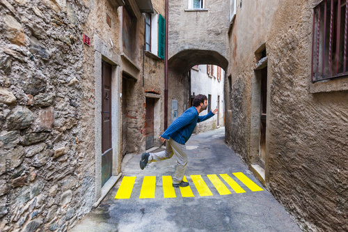 concept of contextualization, zebra crossing in a small alley photo