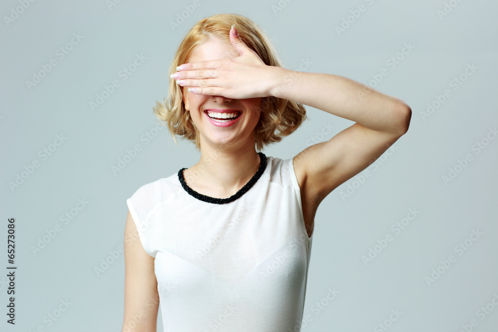 woman closing her eyes with hand woman closing her eyes with hand