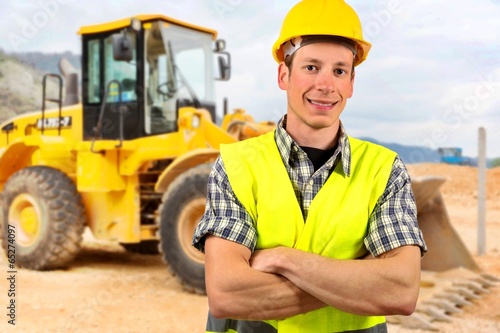 Portrait of a bulldozer driver,at construction site.