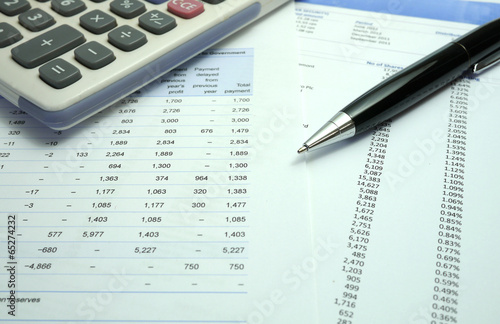 Wallpaper Mural pen and calculator on financial documents Torontodigital.ca