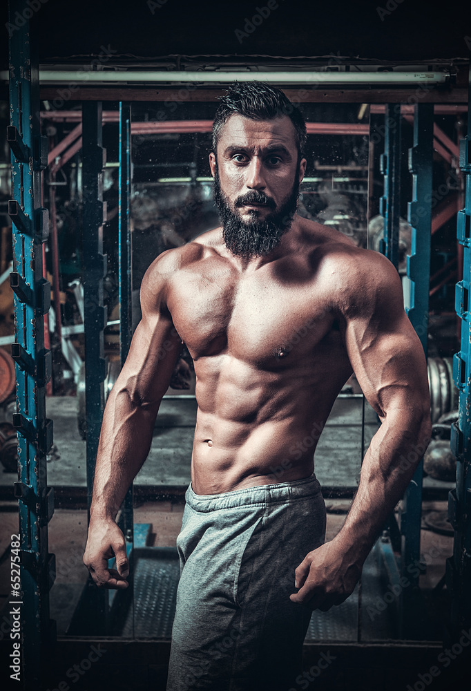 mage of muscle man who is posing mage of muscle man who is posing