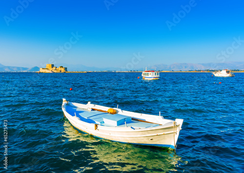 Beautiful small fishing boat in Nafplio town in Greece © imagIN photography