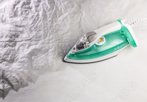 Fotografia, Obraz iron on background crumpled tissue and ironing
