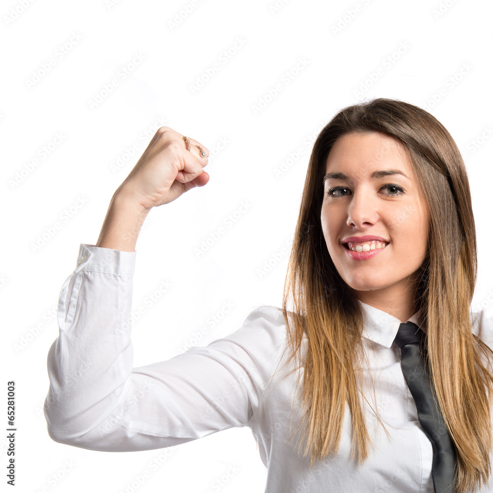 Young businesswoman winning over white background Young businesswoman winning over white background