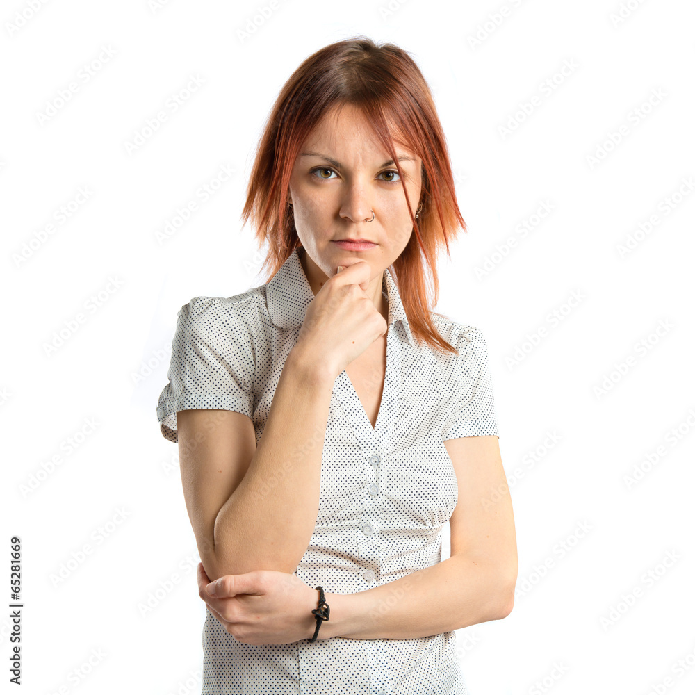 Pretty young girl thinking over white background