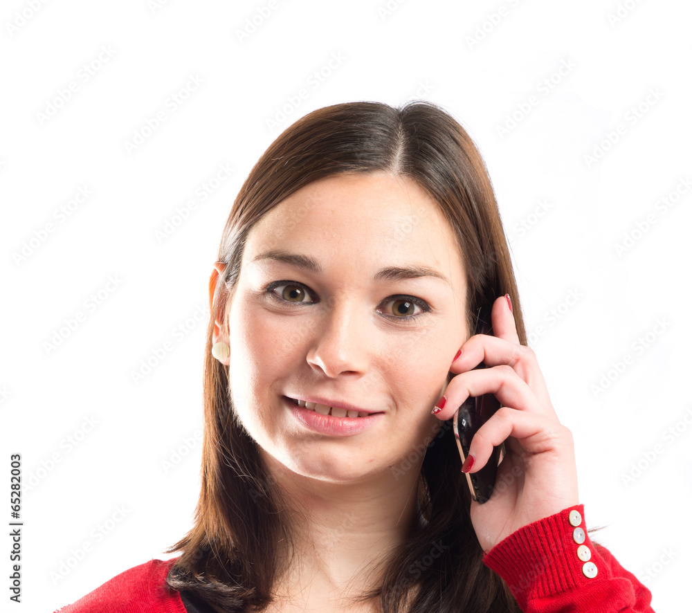 Young girl talking on mobile over white background Young girl talking on mobile over white background