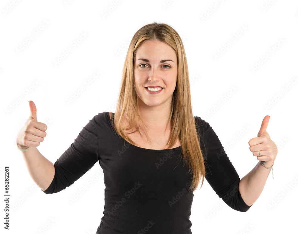 Young woman making Ok sign over white background Young woman making Ok sign over white background