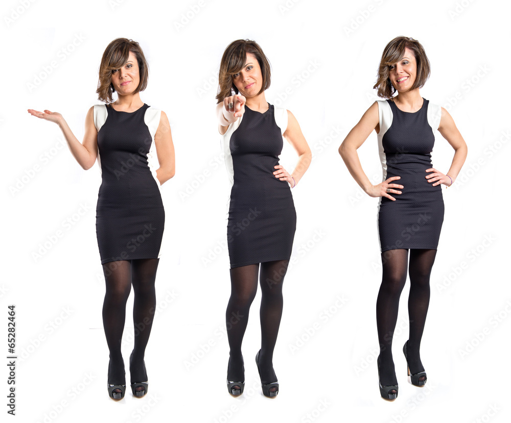Obraz premium Pretty woman in black dress holding something over white backgro