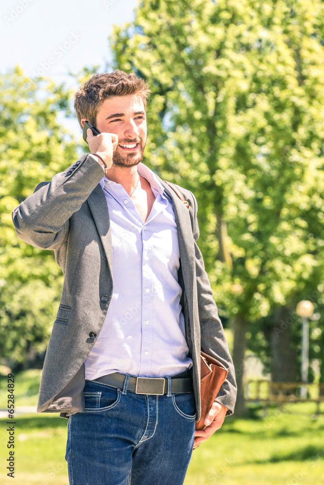 Young businessman with smartphone having a business break Young businessman with smartphone having a business break