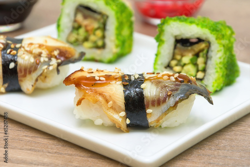 smoked eel sushi closeup. horizontal photo.