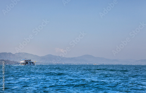 Landscape photo with passenger boats.