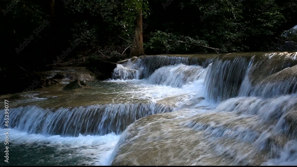 Deep forest waterfall in Thailand (Erawan Waterfall) Deep forest waterfall in Thailand (Erawan Waterfall)