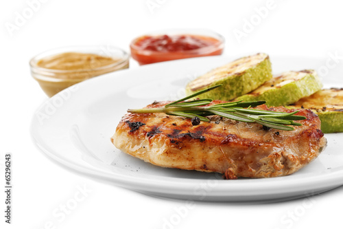 Grilled steak and grilled vegetables isolated on white