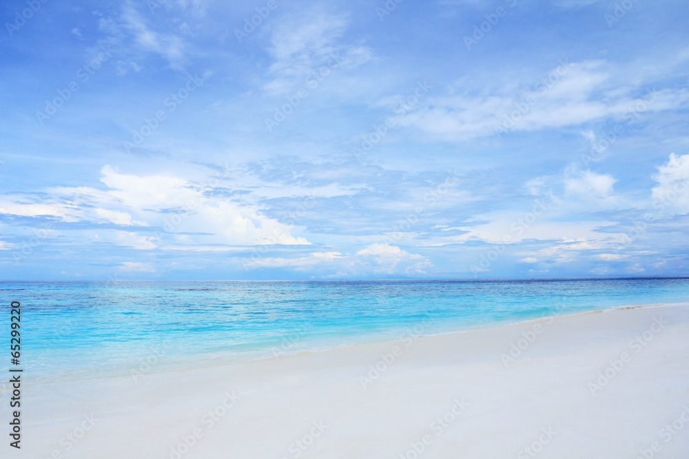 White sand beach with beautiful sky