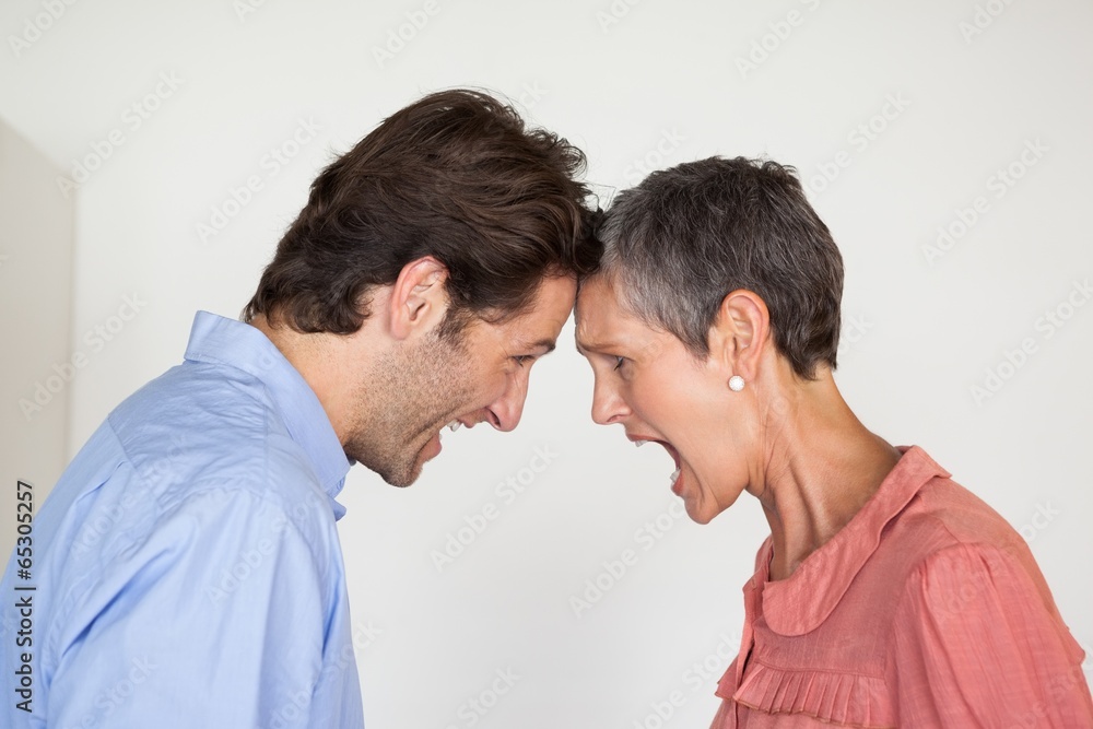 Angry business people shouting at each other Angry business people shouting at each other