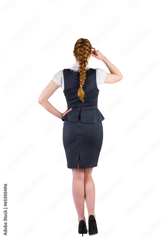Fototapeta premium Redhead businesswoman scratching her head