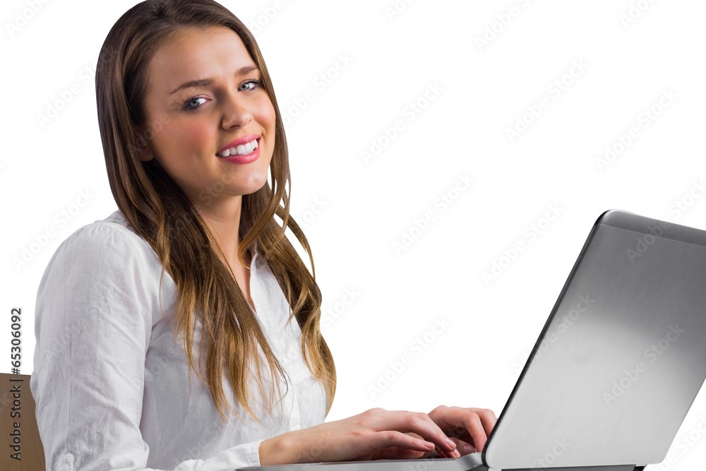 Businesswoman typing on her laptop Businesswoman typing on her laptop