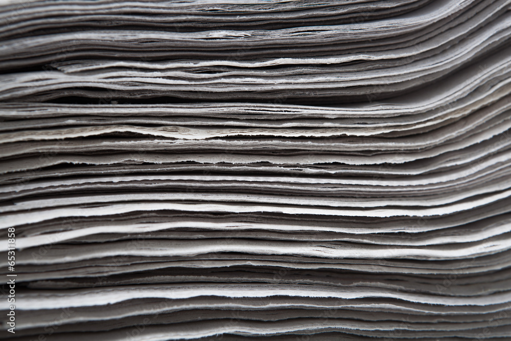 stack of newspapers closeup