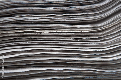 stack of newspapers closeup