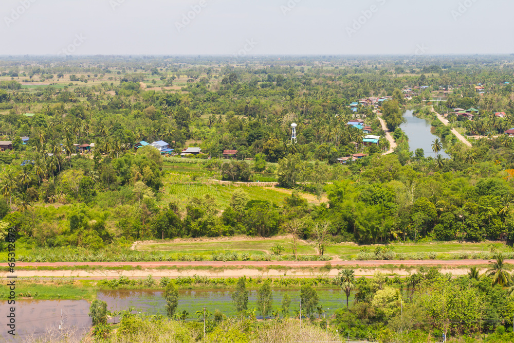 Top view of farmland to housing in the village, one of Thailand Top view of farmland to housing in the village, one of Thailand