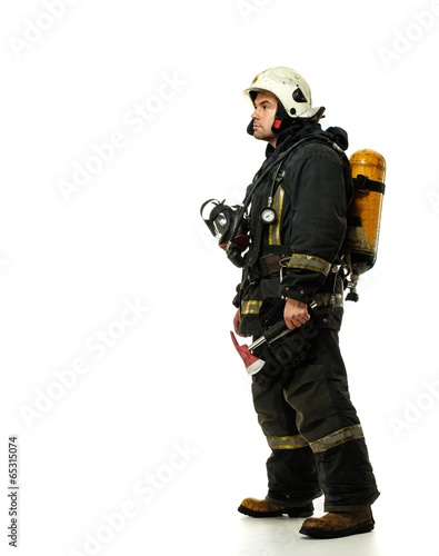 Firefighter with axe and oxygen balloon isolated on white © Nejron Photo