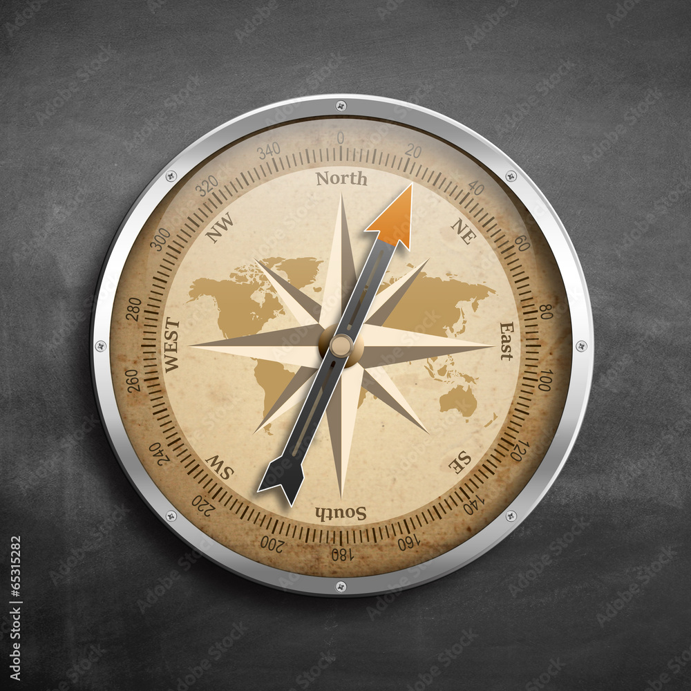 Kompass auf grauem Hintergrund