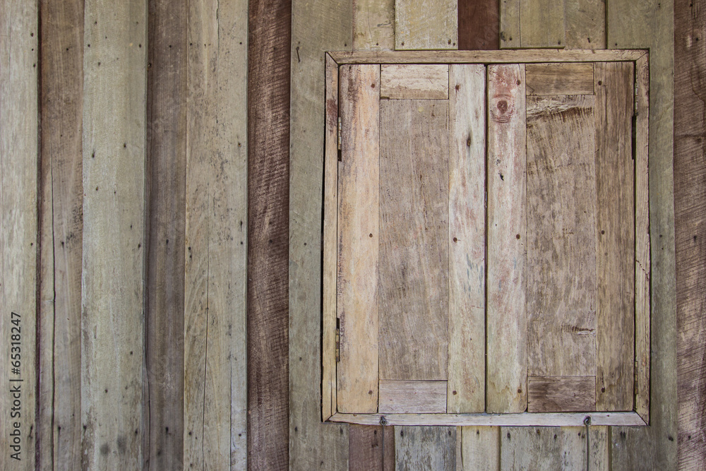 old wood window on wooden wall of home old wood window on wooden wall of home