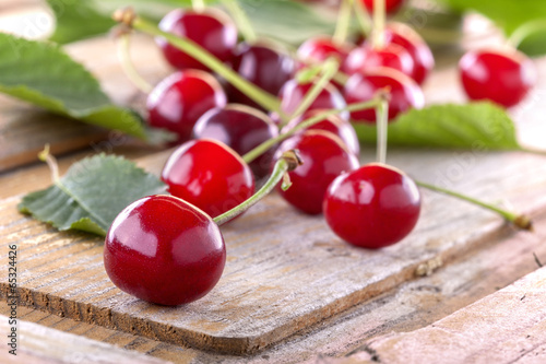 Fresh organic cherrie on the rustic table