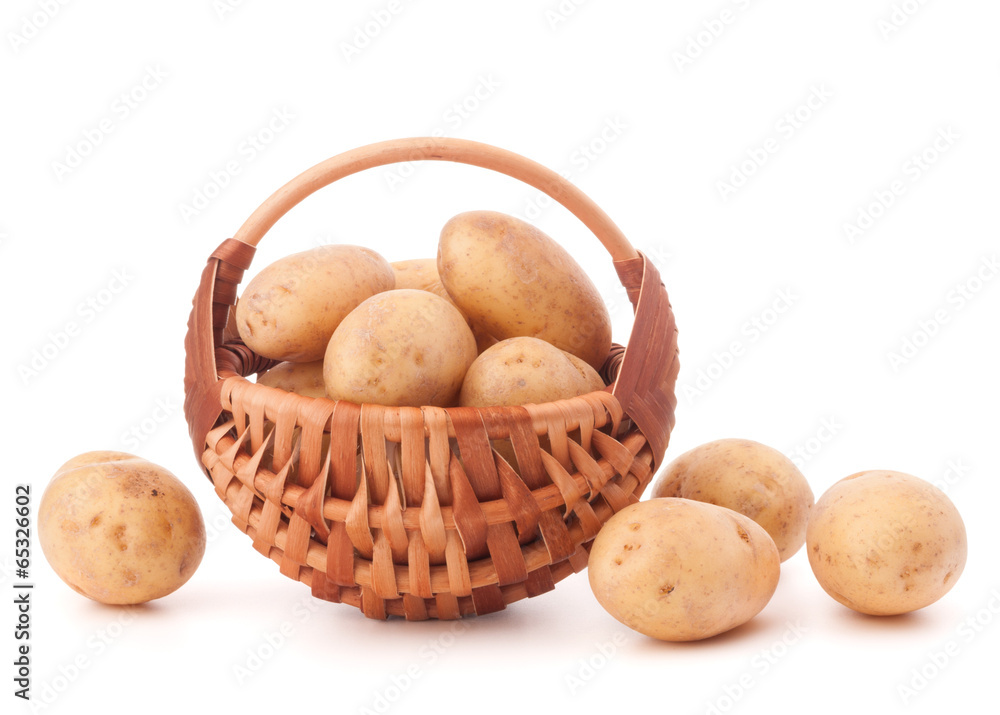 Potato tuber in wicker basket isolated on white background Potato tuber in wicker basket isolated on white background