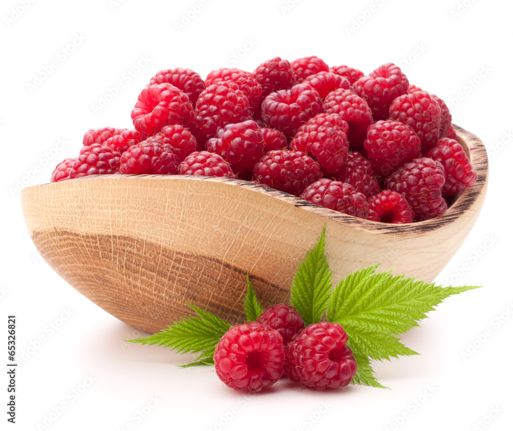 raspberries in wooden bowl raspberries in wooden bowl