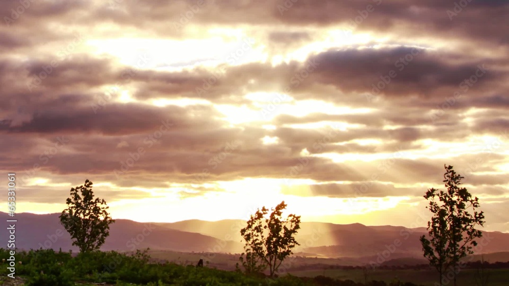 Timelapse of moving clouds over a hill on a windy day Timelapse of moving clouds over a hill on a windy day