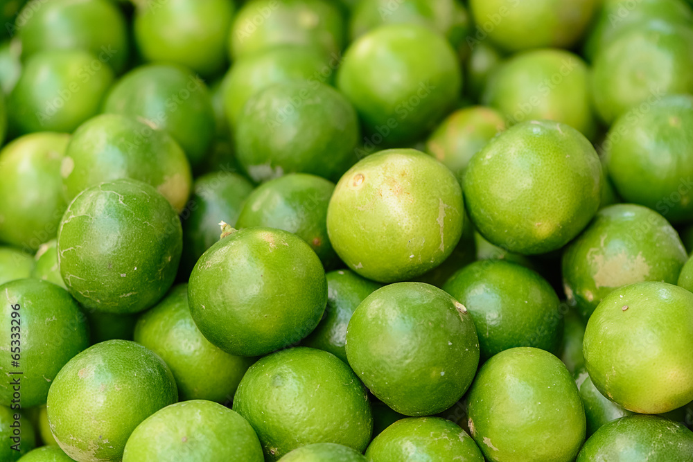 fresh green lemon asia in the market , background blur fresh green lemon asia in the market , background blur