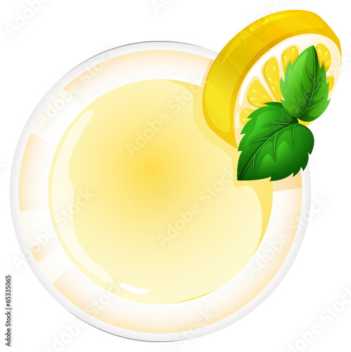 A topview of a glass with a lemon juice