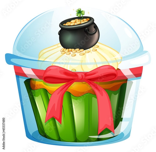 A cupcake with a pot of coins