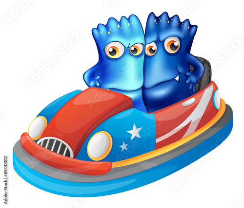 Two blue monsters riding a car
