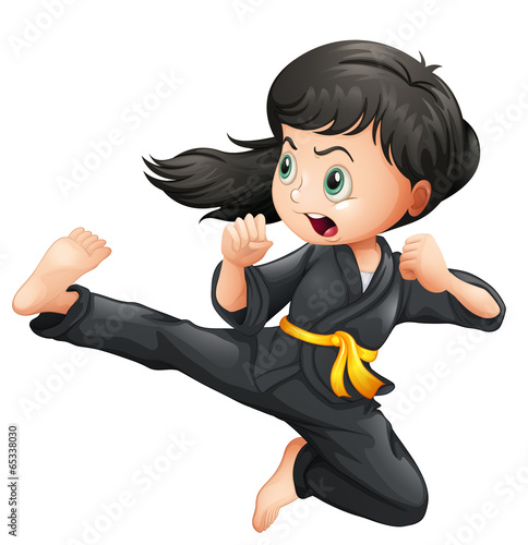 A brave girl doing karate