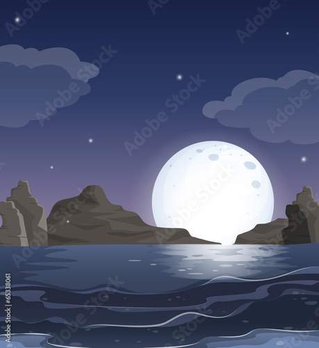 A view of the ocean in the middle of the night