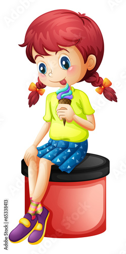 A cute little girl eating icecream