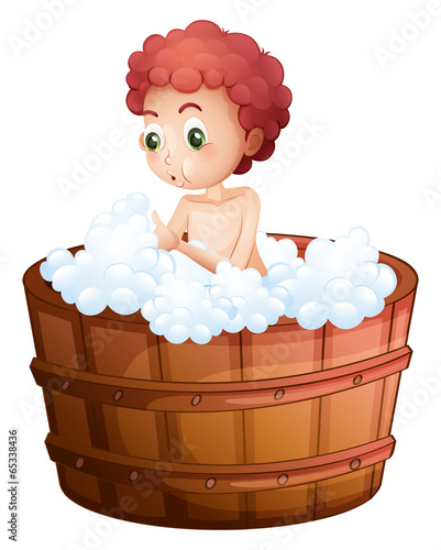 A young man taking a bath