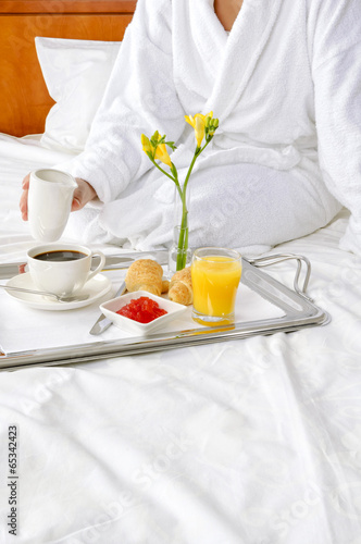 Breakfast in bed at hotel room
