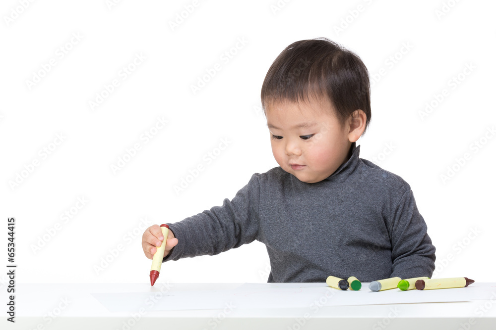 Asia baby boy concentrate on drawing Asia baby boy concentrate on drawing