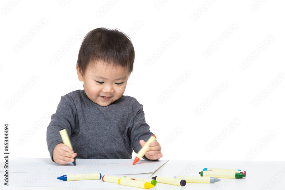 Asian baby boy concentrate on drawing Asian baby boy concentrate on drawing
